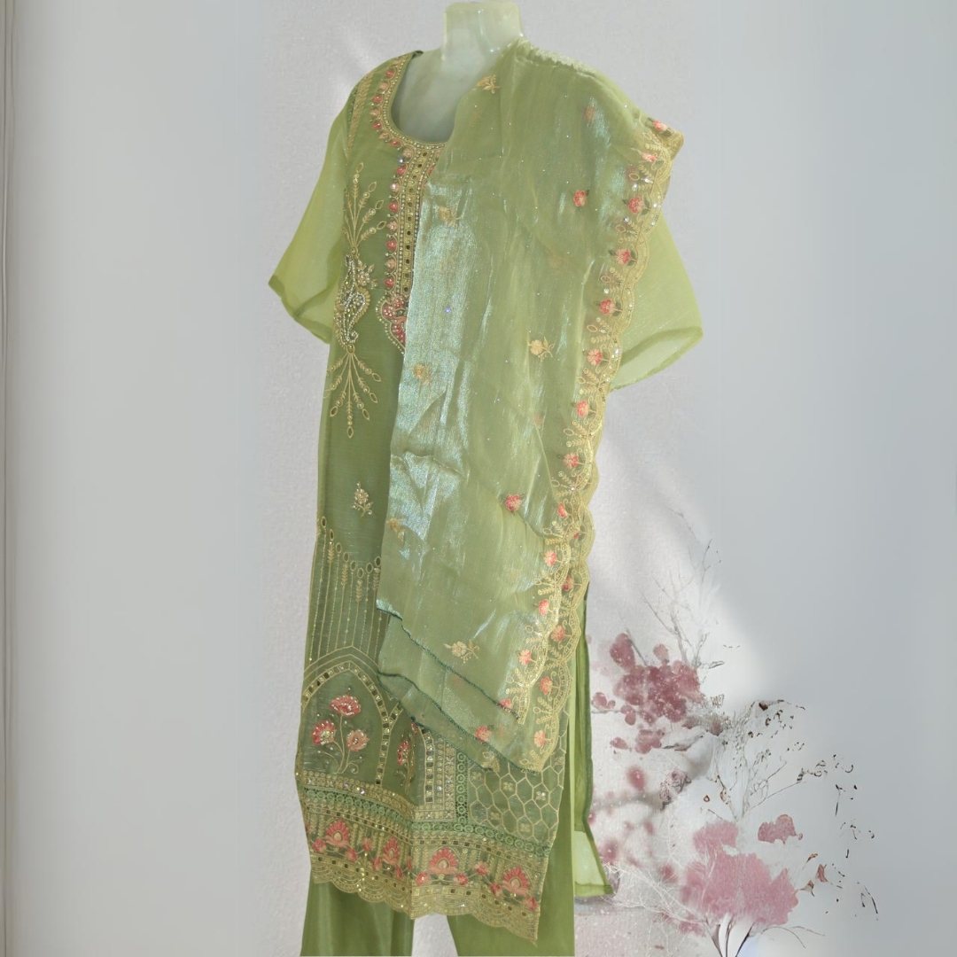 Elegant Pastel Green Salwar Suit with Timeless Patterns and Flowing Dupatta