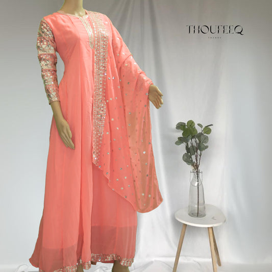 Graceful Peach Anarkali with Intricate Sequin Embellishments