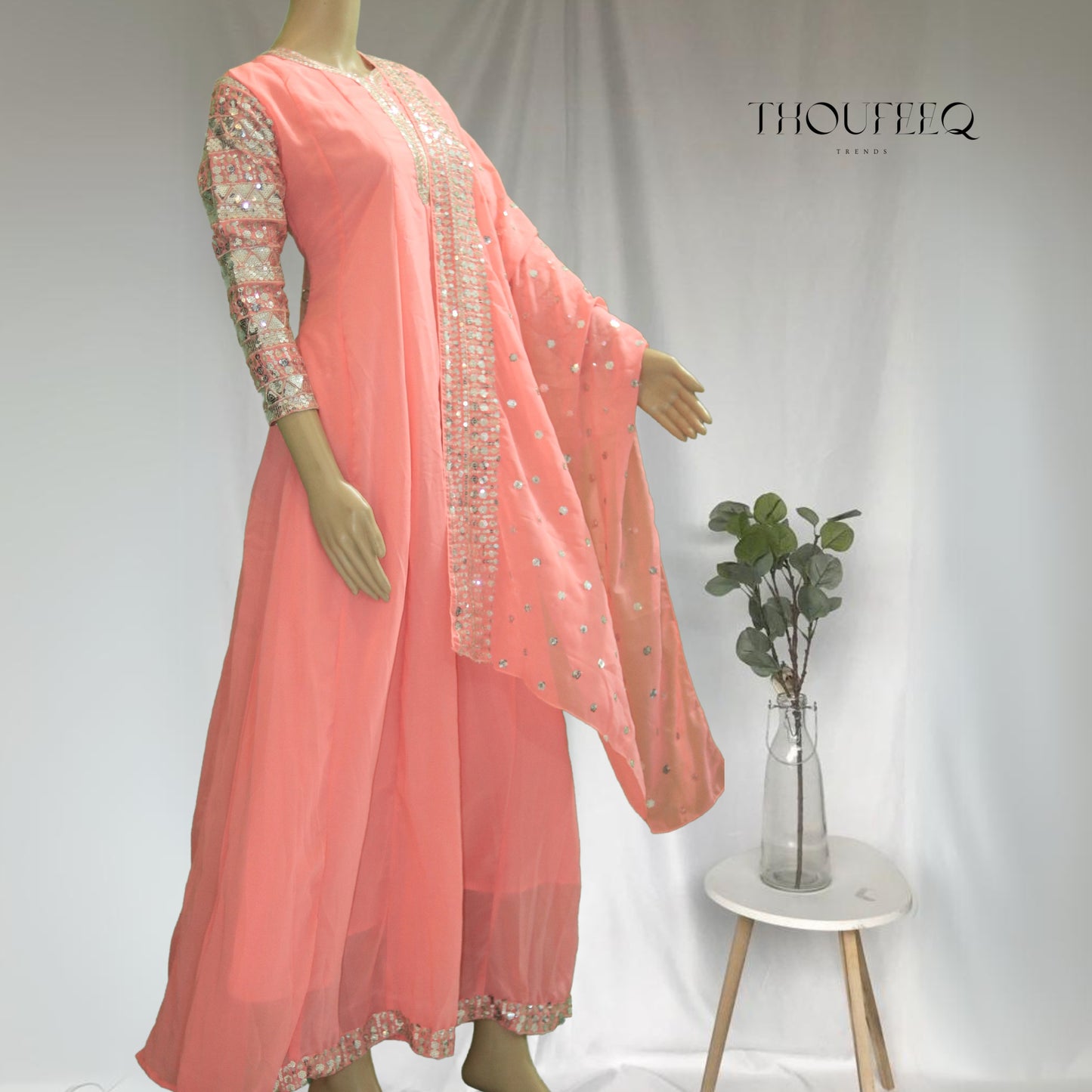 Graceful Peach Anarkali with Intricate Sequin Embellishments