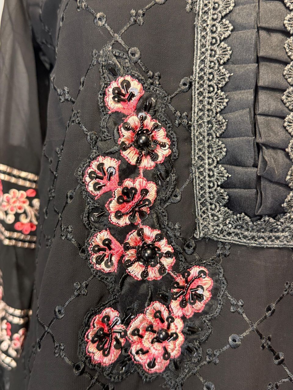 Black Embroidered Suit with Intricate Thread Work and Vibrant Floral Dupatta