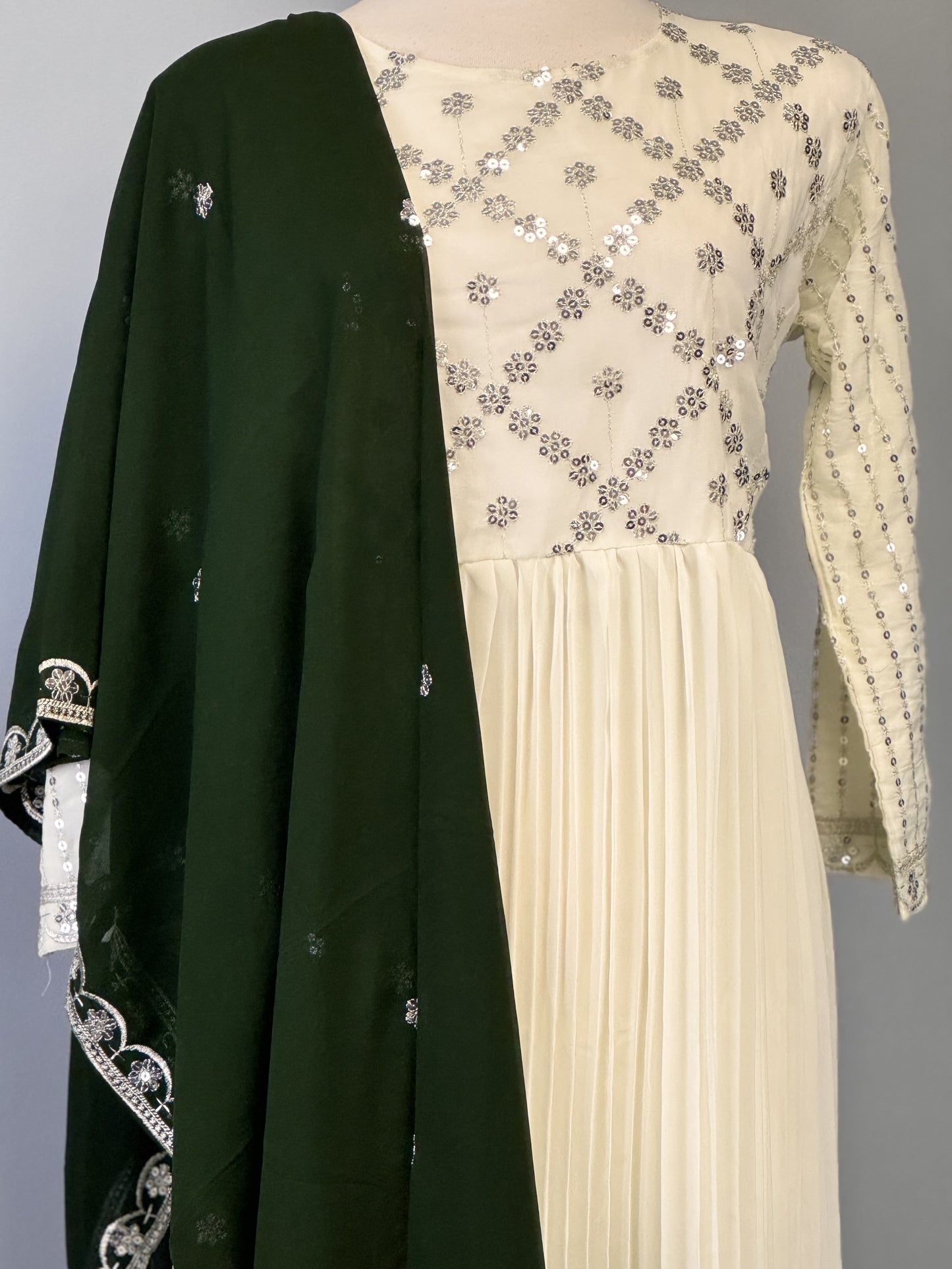 Charming White Sequined Suit Paired with Vibrant Green Dupatta