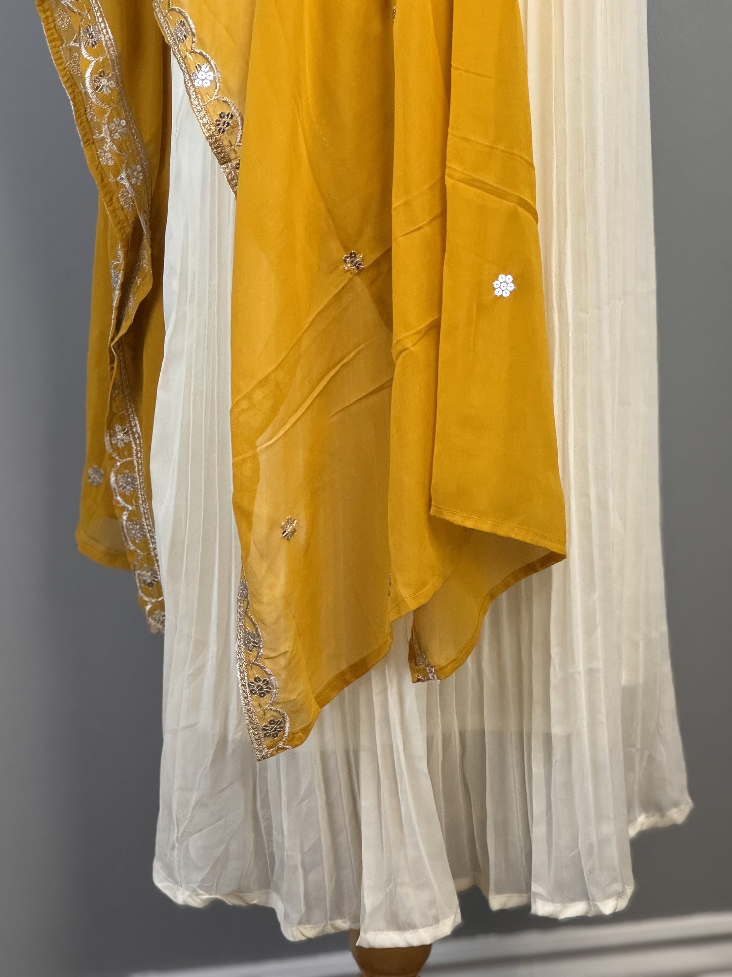 Stunning White Sequined Suit Paired with Vibrant Yellow Dupatta