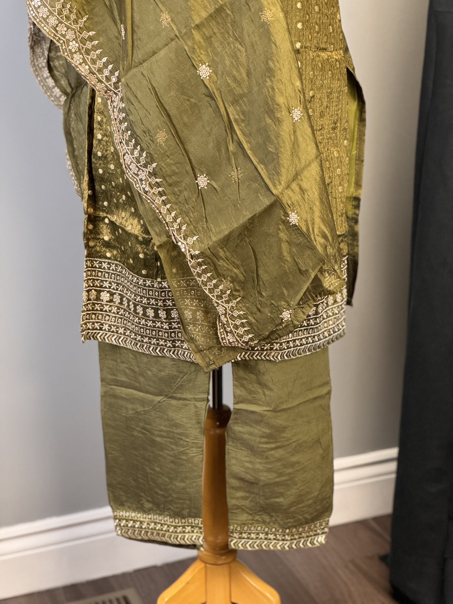 Opulent Olive Green Salwar Suit Featuring Striking Golden Bead Accents