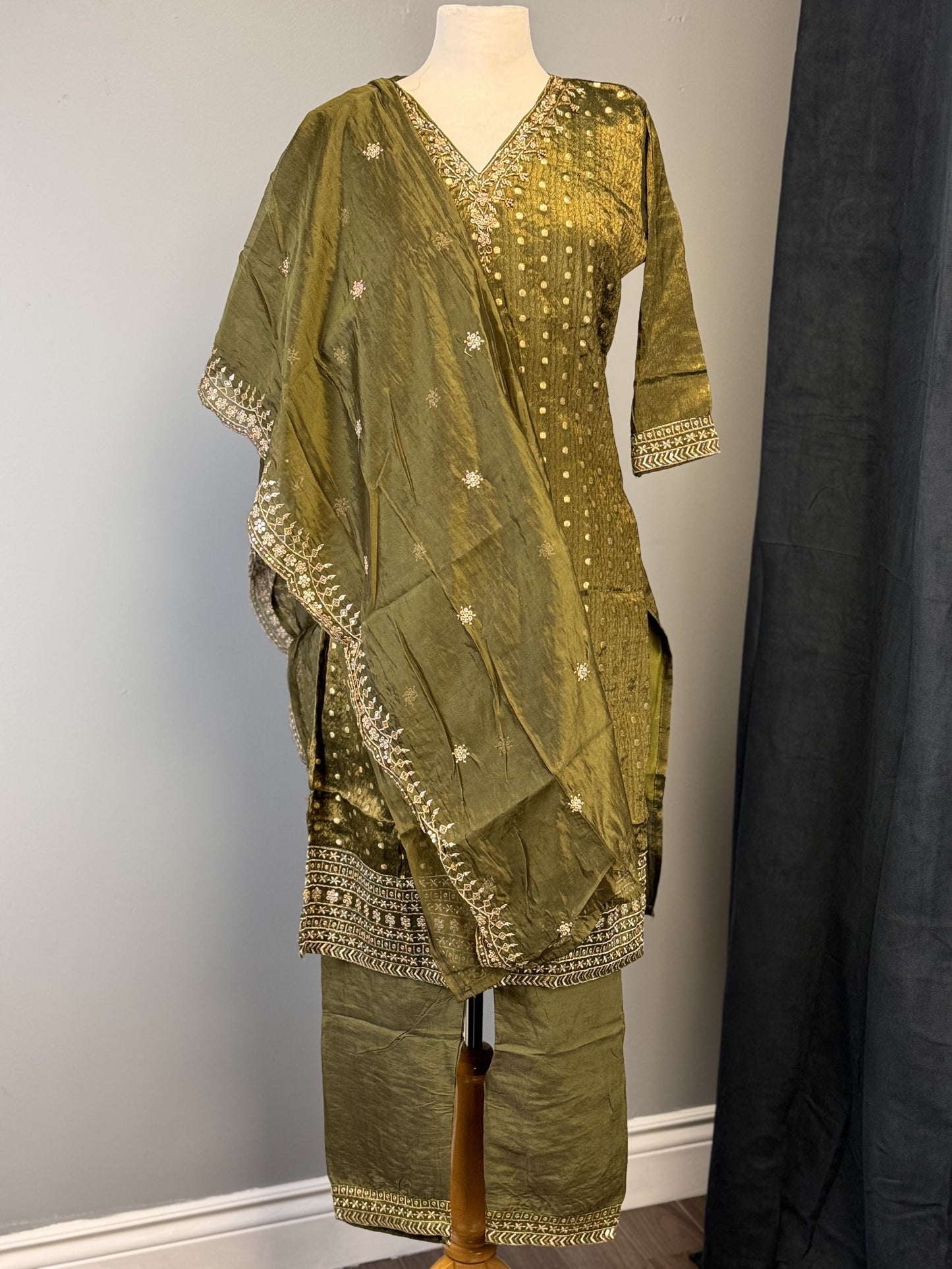 Opulent Olive Green Salwar Suit Featuring Striking Golden Bead Accents