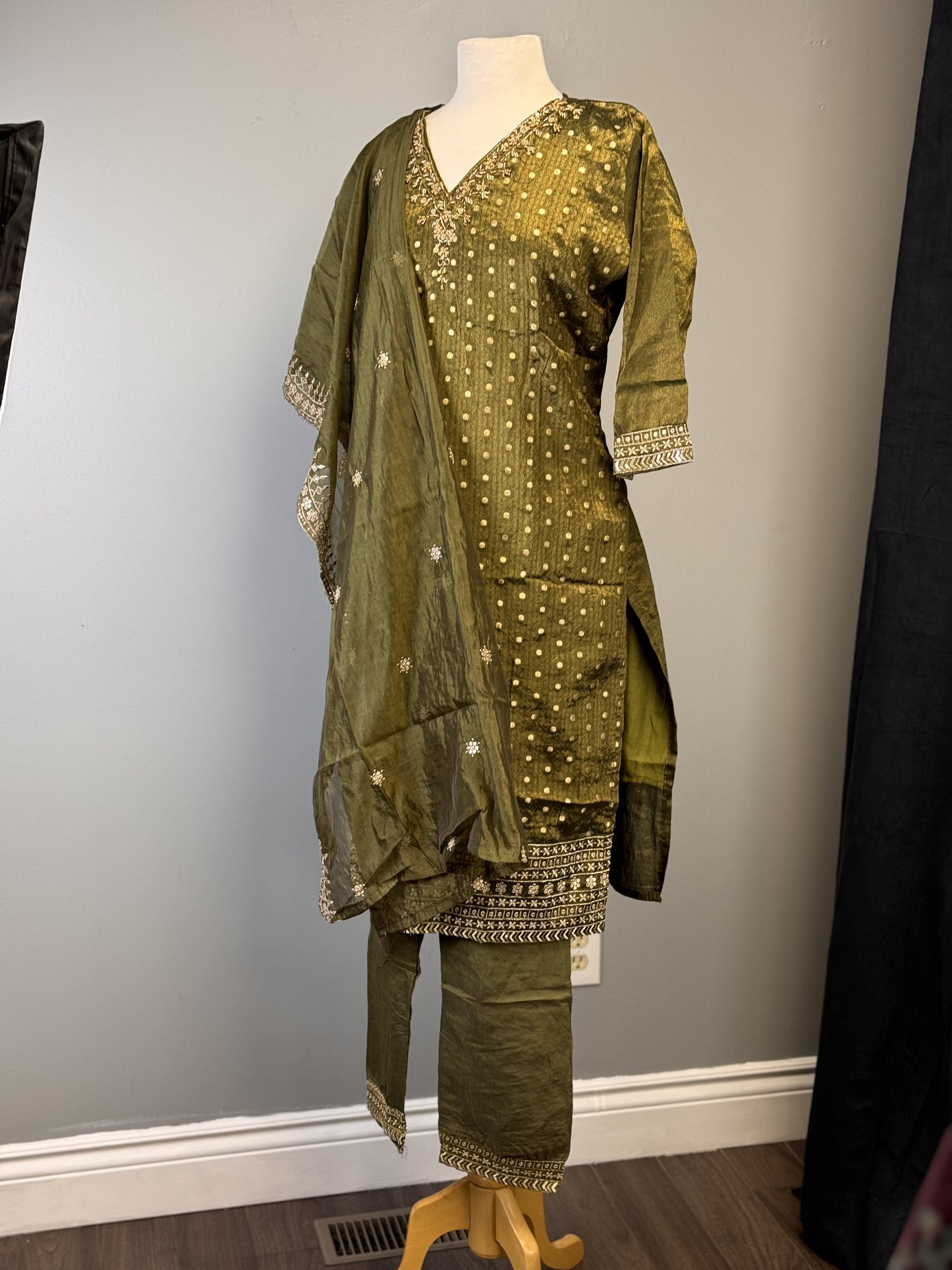 Opulent Olive Green Salwar Suit Featuring Striking Golden Bead Accents